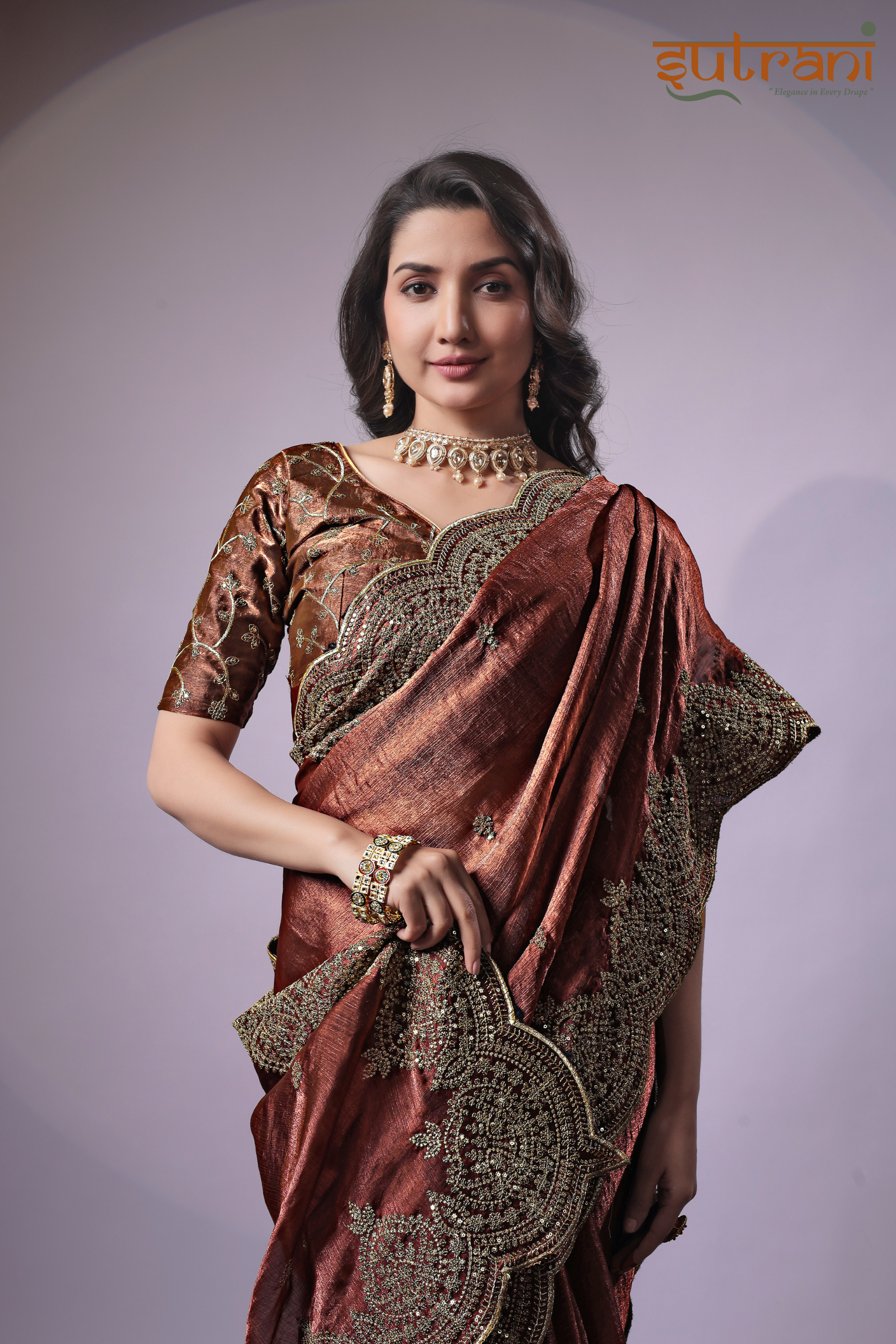 Sutrani Luxury Copper Embroidered Saree