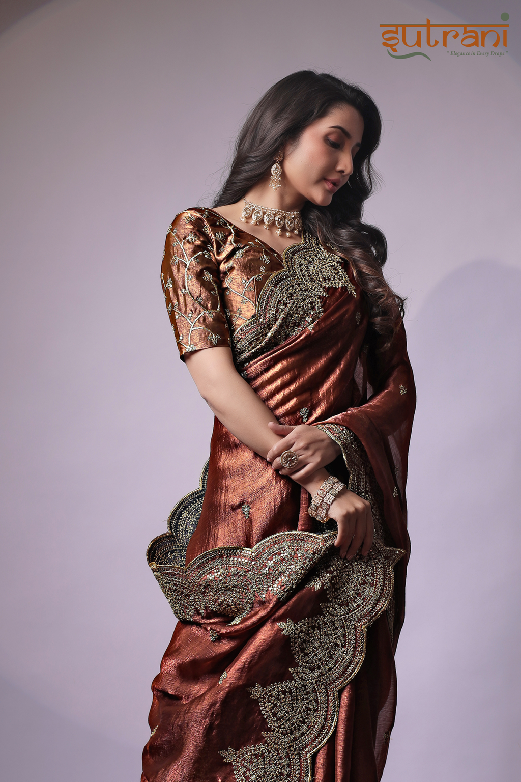Sutrani Luxury Copper Embroidered Saree